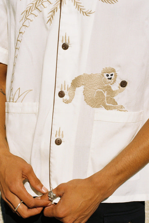 Close up of a male model wearing the shirt