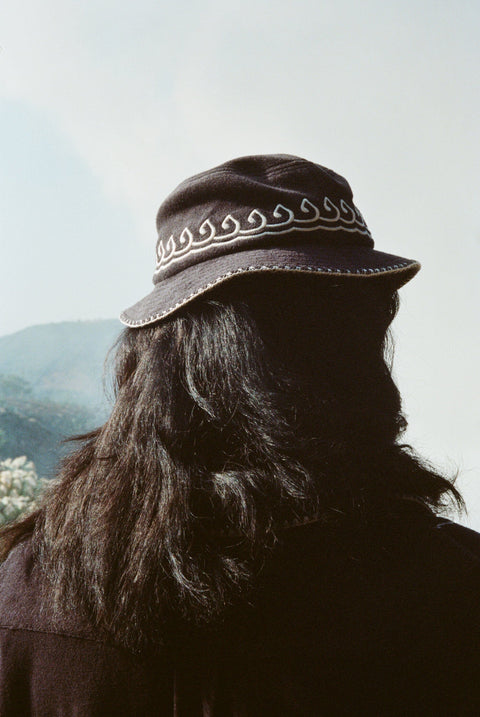 Man wearing bucket hat