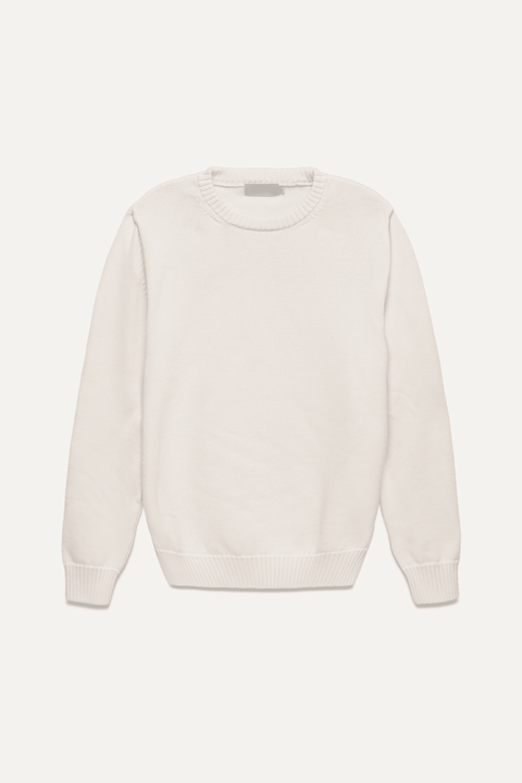 A cream-colored crewneck sweater with long sleeves and ribbed cuffs and hem, displayed flat against a light off-white background - Inkerman NYC