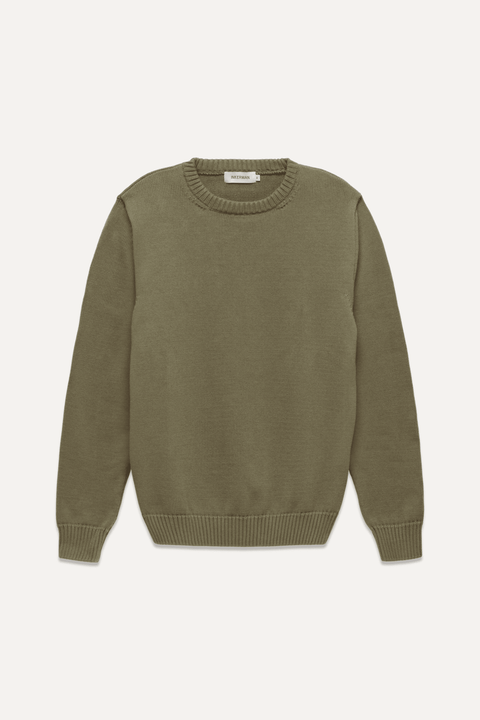 An olive green crewneck sweater with ribbed cuffs and hem, displayed flat against a light off-white background - Inkerman NYC