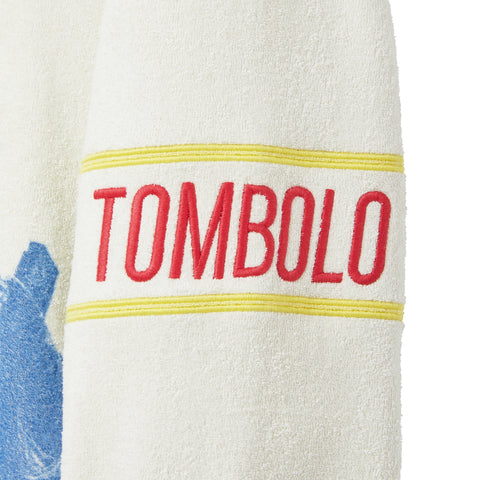 Tombolo' patch at the sleeve.