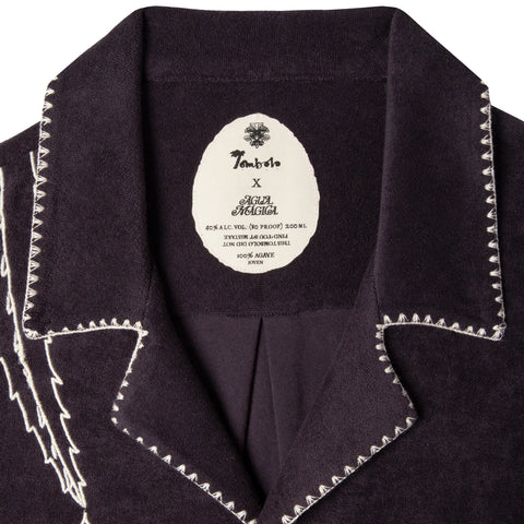 Terry cloth beach shirt from Tombolo and Agua Magica perfect for sipping mezcal
